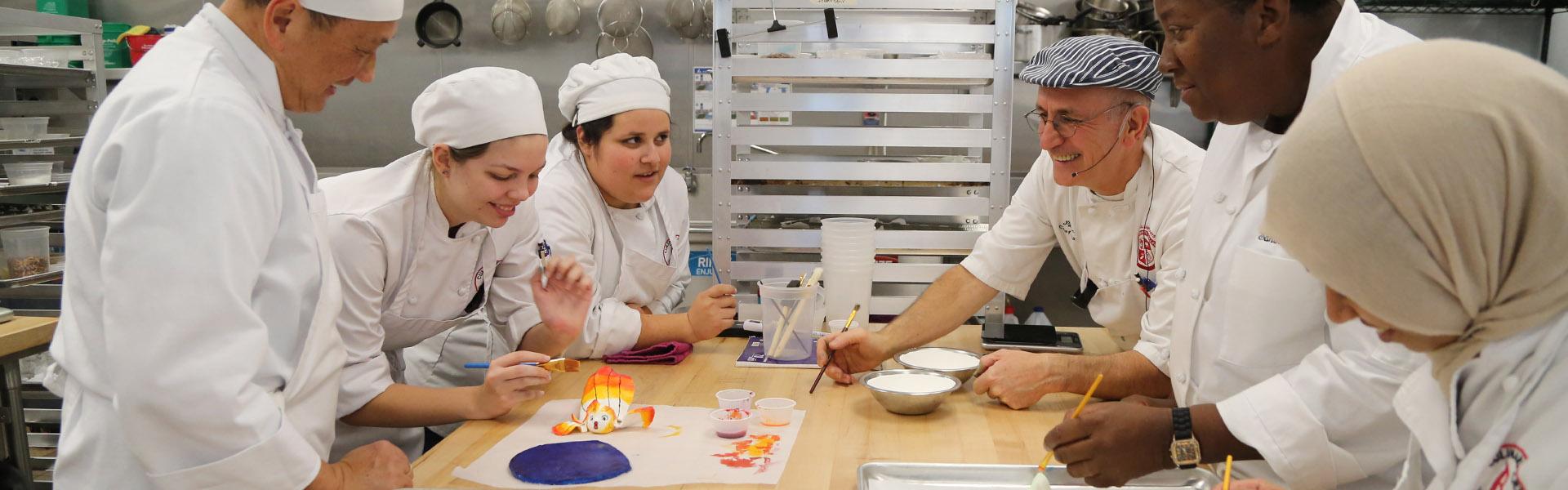 Chef Perry teaching students culinary arts at LBCC Culinary Arts kitchen