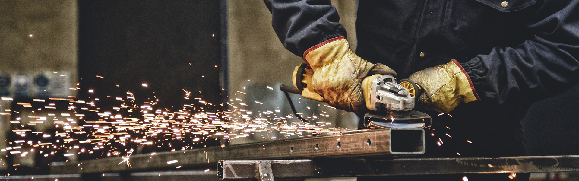 A worker working on metal fabrication