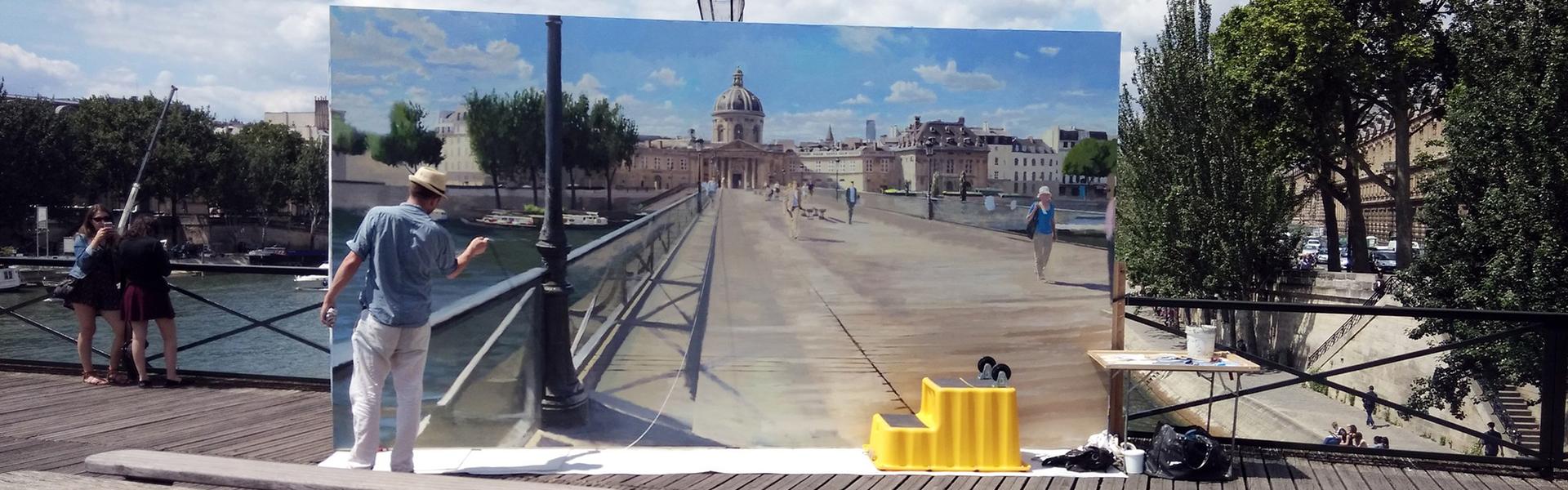 Painter painting the scenery at the Seine Bridge