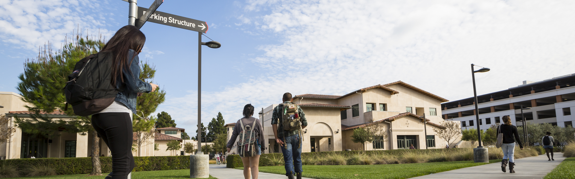 A wide shot of students walking on the LAC campus.