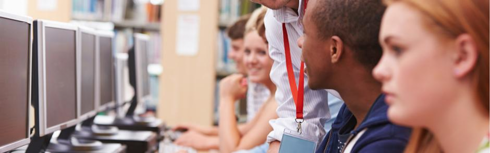 students looking at computers