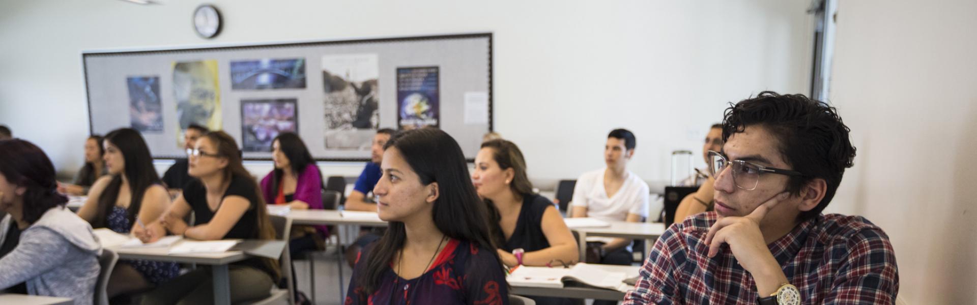 Students listening to a class lecture.