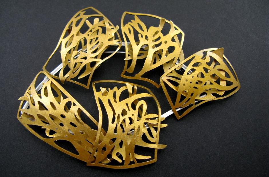 A piece of golden jewelry.