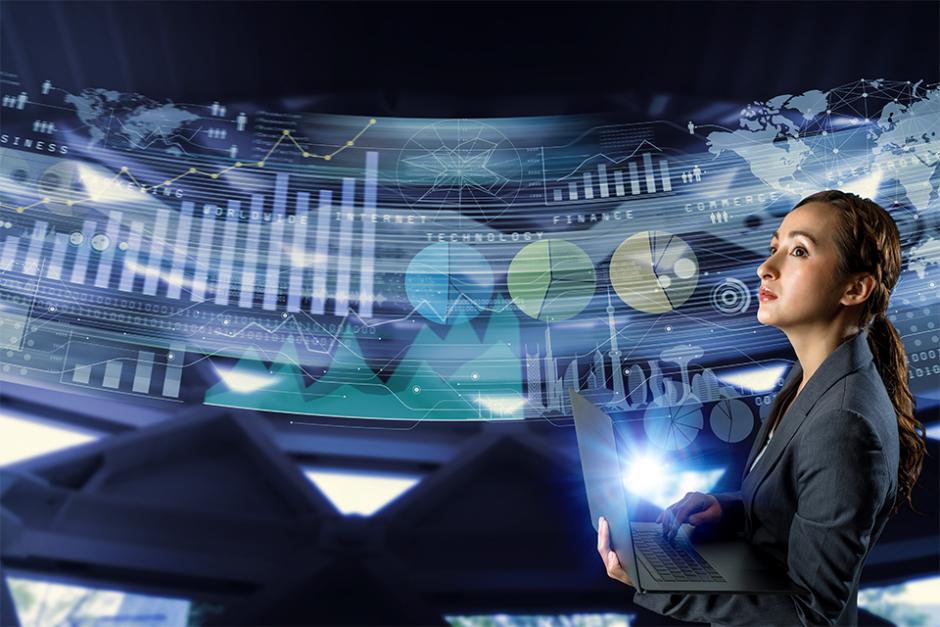 A girl looking at business graphics for Economics