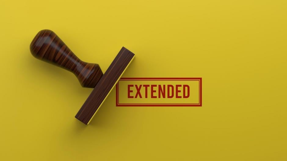 EXTENDED Rubber Stamp On Yellow Background 3D Rendering