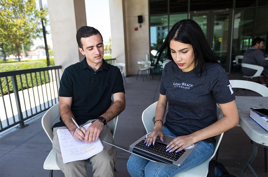 LBCC students working on school work in pair