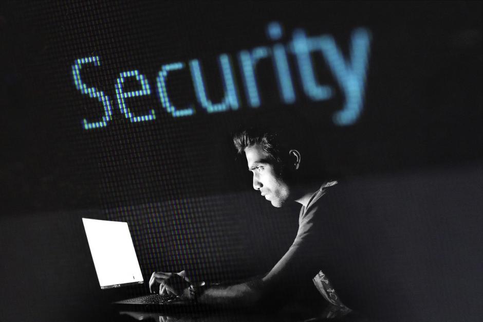 hacker in a dark room