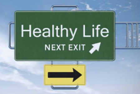 Healthy Life freeway sign with arrow pointing to the blue sky