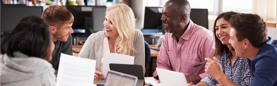 Group Of Mature College Students Collaborating On Project preparing to enter workforce