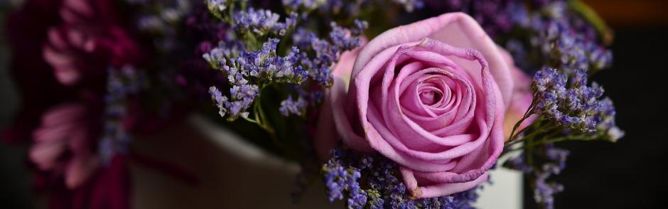 A purple rose bouquet.