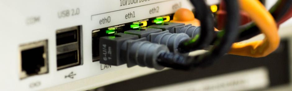 A router with ethernet cables.