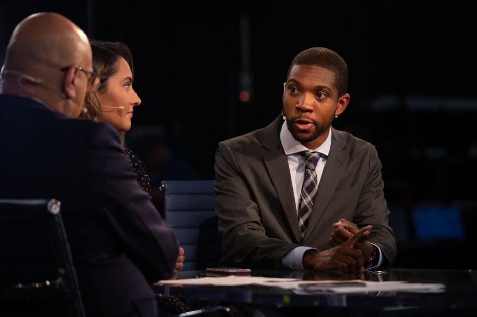 A picture of NBC News Reporter, Shaquille Brewster and several political correspondents.