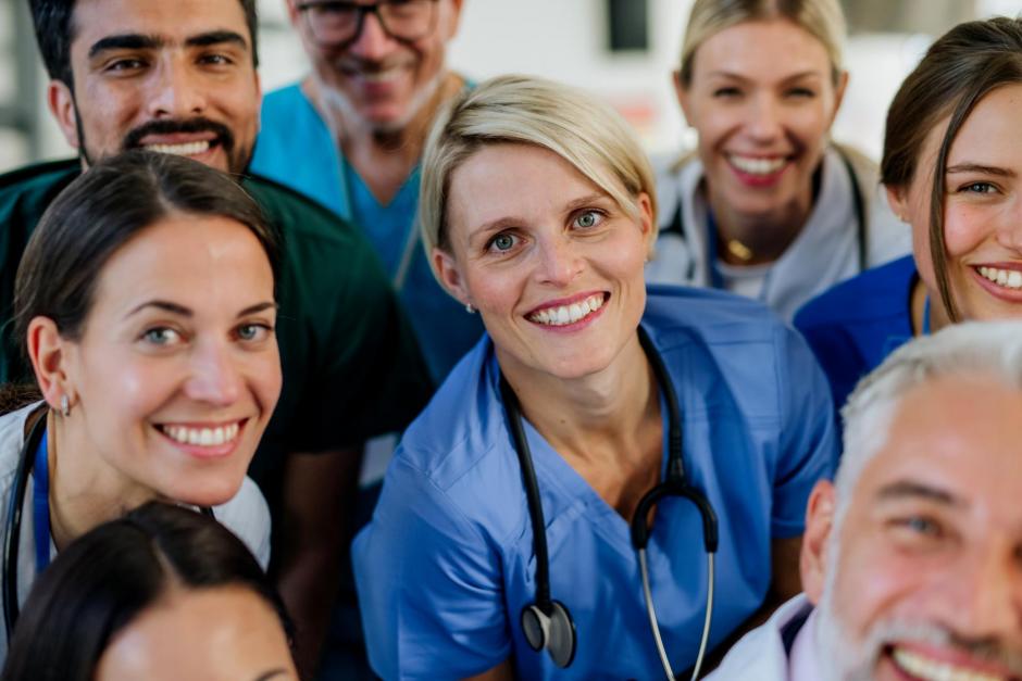 Portrait of happy doctors, nurses and other medical staff