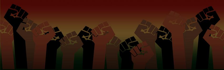 Juneteenth background with multiple fists up in the air