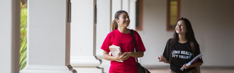 Two female students walking down the halls at LBCC.