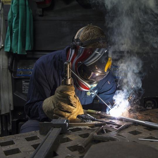 A man spot-welding