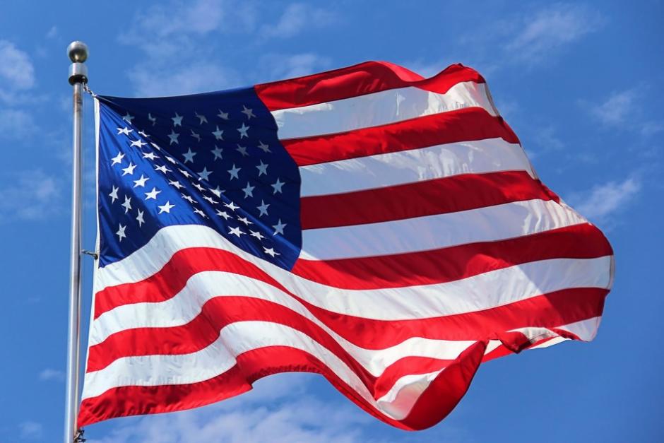 The U.S. flag waving in the sky.