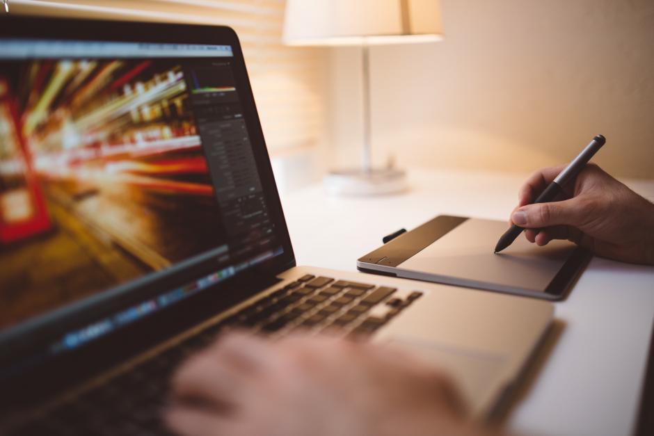 A person working on a laptop.