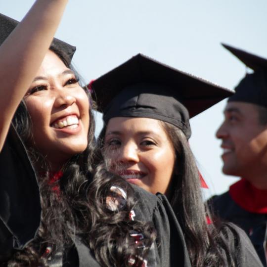 LBCC students waving at the commencement