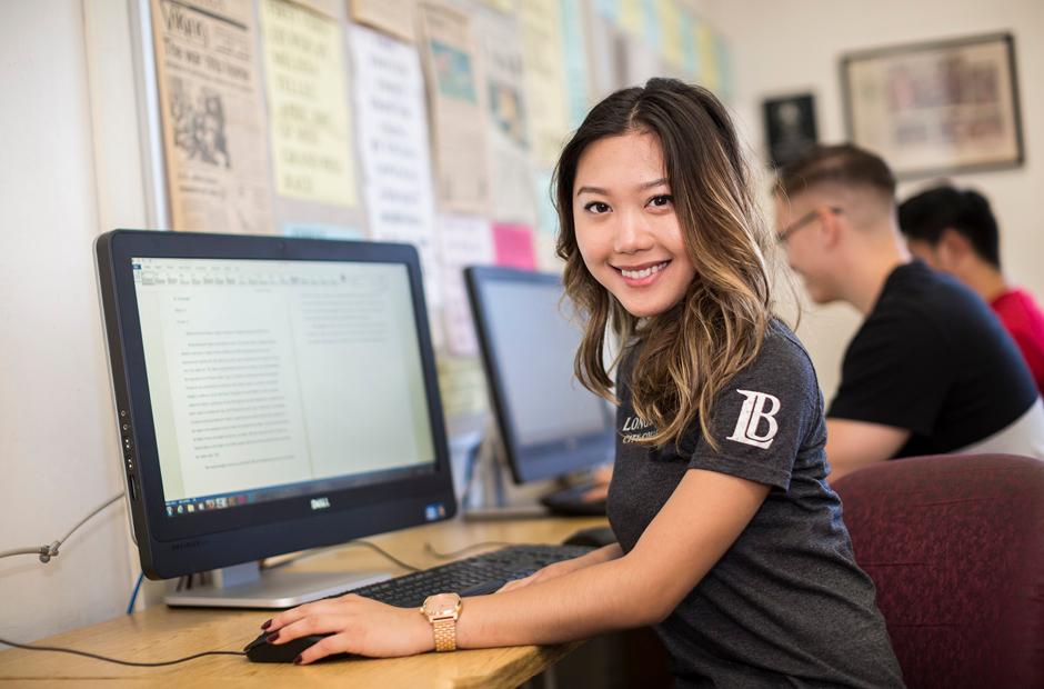 International students working on desktops in computer lab. 