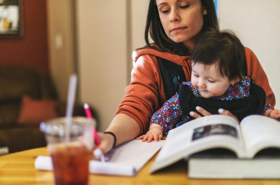 a mother student with a child