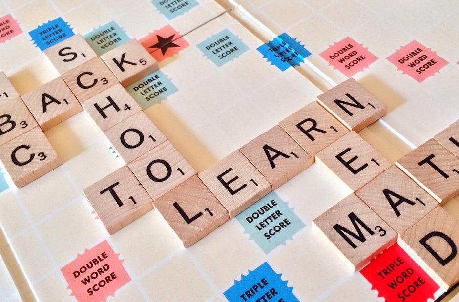 Scrabble tiles on a board.