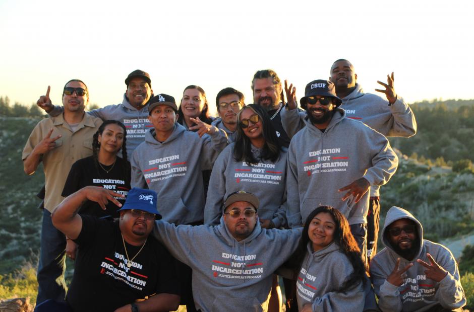 Justice Scholars - a group of happy people in the photo