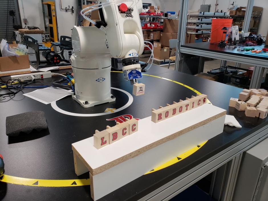 LBCC Robot arm displaying wood block