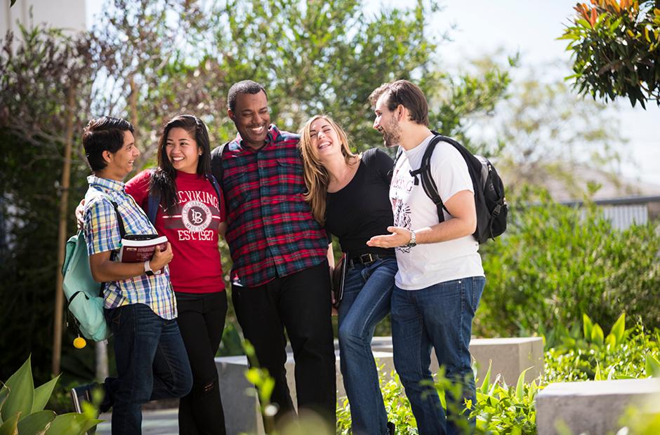 LBCC Students in diverse ethnicity hanging out on campus laughing
