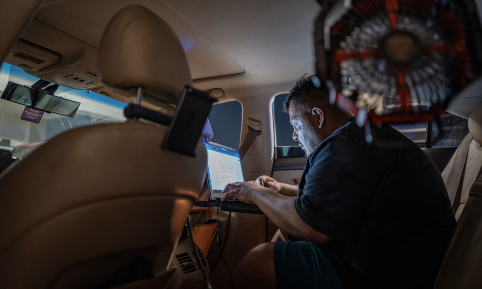 Long Beach City College student Edgar Rosales Jr. works on homework in the back seat of his car. (Barbara Davidson/For The Washington Post) Long Beach City College student Edgar Rosales Jr. works on homework in the back seat of his car. (Barbara Davidson/For The Washington Post)