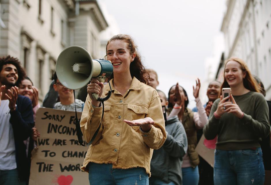 Woman with a megaphone in a rally