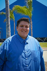 A headshot of Chris Marroquin